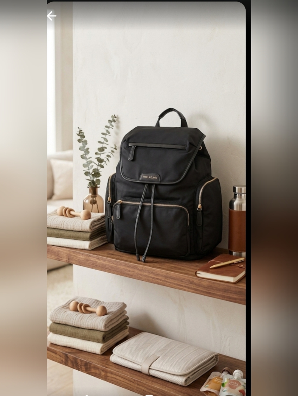 TWELVELITTLE DIAPER BAG BACKPACK IN BLACK.